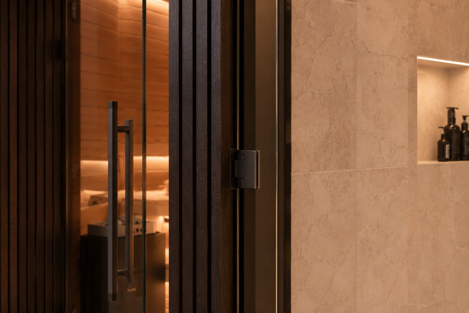 Glass door and cladding detail on the Wellness Pod at night